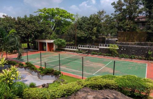 Khandala Villa | StayVista's Shantam House - Dive into relaxation with a pool and tennis lawn