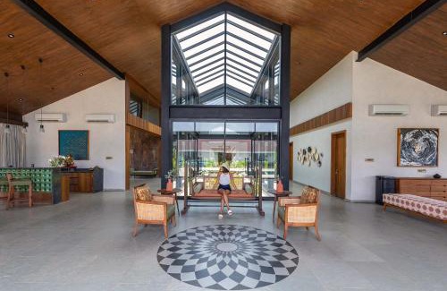 Lonavala Villa | StayVista's The Barn - Mountain-View Luxury Mansion with Heated Infinity Pool, Deck, Jacuzzi, Lawn featuring a Gazebo and Firepit