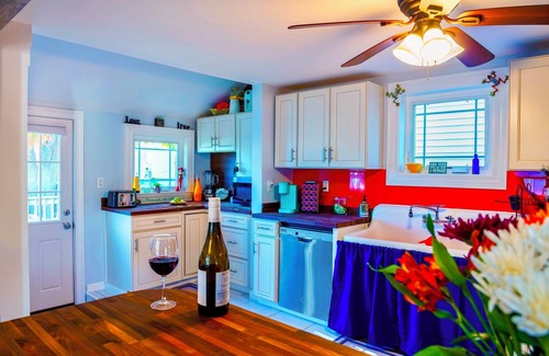 Devon House | Steps 2 Beach, Fish Pond & Tropical Backyard Oasis!