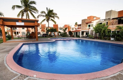 Mazatlan Villa | Steps away from The Beach, with beautiful pool and garden views.