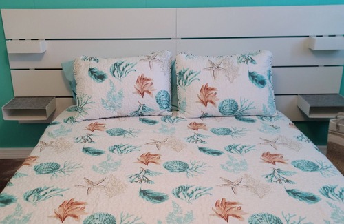 Indialantic By The Sea Condo | Steps From The Beach, 2BR/1BA Family Vacation Getaway in Melbourne, FL. Cool A/C