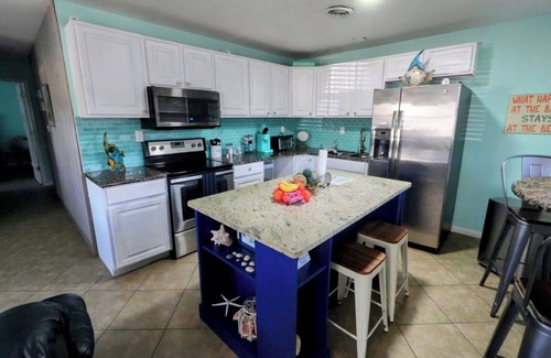 Cocoa Beach House | Steps to Beach - Spacious 2BR + Arcade & Resort Backyard