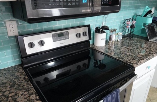 Cocoa Beach House | Steps to Beach - Spacious 2BR + Arcade & Resort Backyard