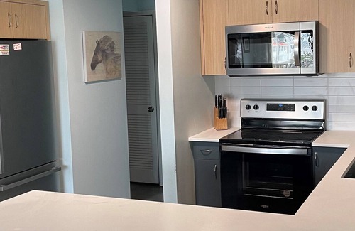 Sea Isle City Condo | STEPS to the beach and beautiful ocean views from the front deck.