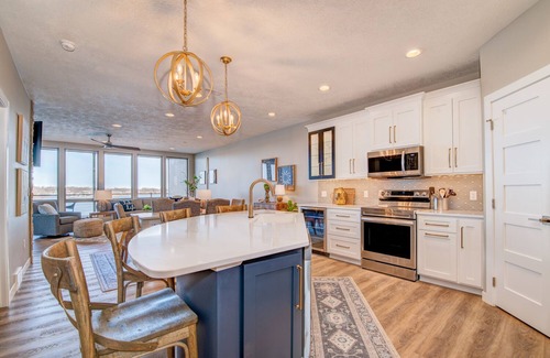 Arnolds Park Condo | Stillwater condo with East Lake Okoboji views!