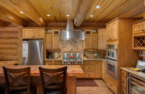 Steamboat Springs Villa | Stone Creek Lodge, a stunning log home with a game room, private hot tub, Gigabit internet, more!