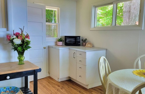 Whitehall Cottage | Storybook Sunset Cottage on White Lake. Excellent Location. Dock & Kayaks.