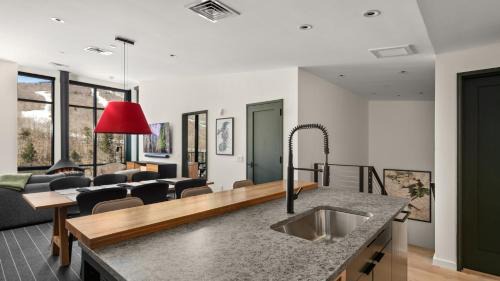 Stowe Area Apartment | Stowe Mt Resort Treehouse Ski in Ski Out Mt Views By Stowe Mountain Rentals