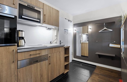 Wremen Apartment | Strandnahe Ferienwohnung mit Sauna und Tollem, Großem Balkon mit Xxl-strandkorb