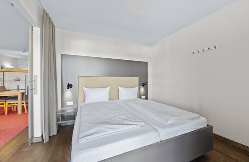 Wremen Apartment | Strandnahe, Hundefreundliche Ferienwohnung mit Sauna und Balkon mit Strandkorb