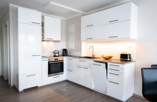 Schonberger Strand Apartment | Strandwohnung mit großer Terrasse in erster Reihe am Schönberger Strand, Kajak, Wallbox, 24h self check-in, DisneyPlus