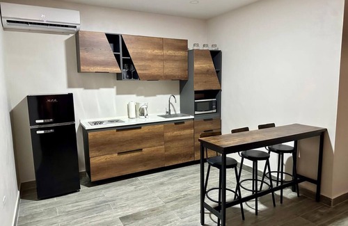 Oranjestad-West Apartment | Studio 4 Luxurious, 3-minute walk to the beach in an exclusive neighborhood.