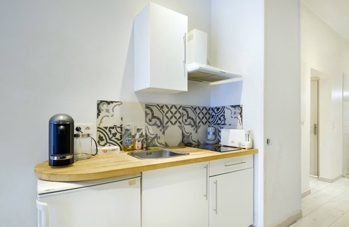 Quartier du Port Apartment | Studio Apartment 'Appartement Cosy - Sur Le Port' with Shared Garden, Wi-Fi and Air Conditioning