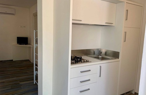 Chiesiola Apartment | Studio Apartment 'Baia Falcone-Villetta Mare 103' with Sea View, Wi-Fi and Air Conditioning