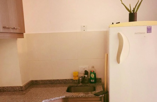 Comuna 12 Apartment | Studio apartment with garage and balcony overlooking the city