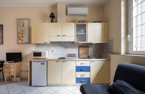 Historic Center Apartment | Studio Calari with Terrace by Wonderful Italy