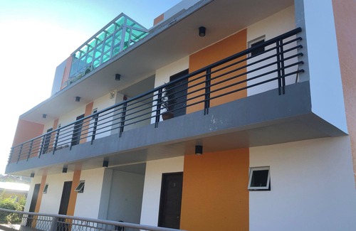 Bacnotan Apartment | Studio Suite in a peaceful green, beach front space.This unit can sleep up to 6!