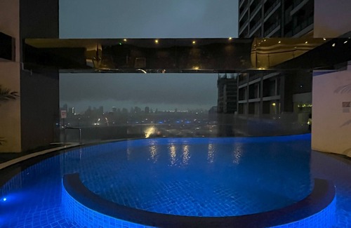 Downtown Condo | Studio type Condo with City View, FAST WIFI, 55” TV, Gym, Pool, & near Nightlife