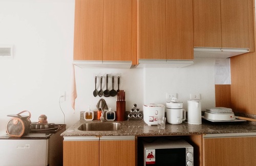 Mactan Export Processing Zone Condo | Studio Unit Near Airport at Amani Grand Resort with Pool