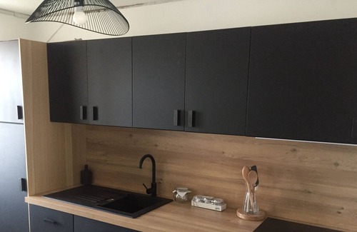 Lamballe Apartment | Studio with separate bedroom. In the center of lamballe, courtyard side, quiet.