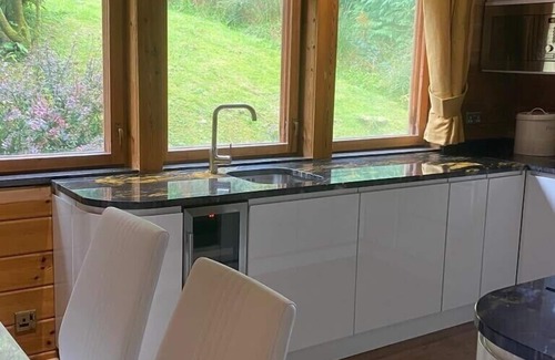 Portsonachan Cabin | Stunning 3 Bedroom Lodge with Sauna ,Hot Tub and Lochside Leisure Deck