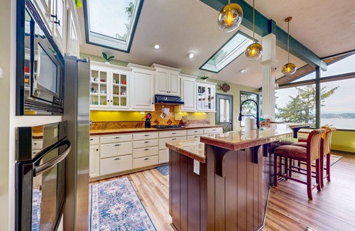 Federal Way House | Stunning Home, Breathtaking Views, w/Hot Tub, WIFI, & Two Kids Play Areas!
