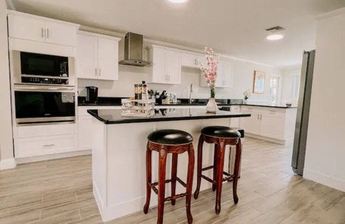 Florida Central Atlantic Coast House | Stunning Lake Front House near Disney & Universal