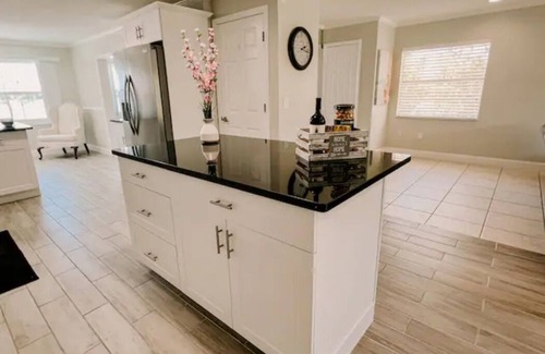 Florida Central Atlantic Coast House | Stunning Lake Front House near Disney & Universal