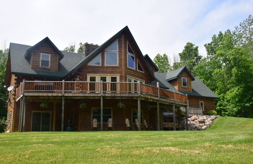 Homerville Cabin | Stunning Log Cabin on 65 Acres with a new swimming pool
