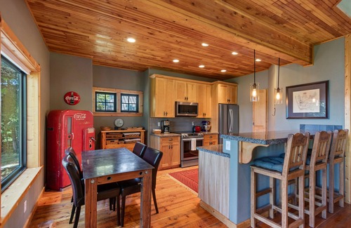 Coeur d'Alene House | Stunning mountain escape with lake views, expansive furnished deck & firepit - dog-friendly