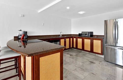 Conchas Chinas House | Stunning oceanview suite with cliffside infinity pool, terrace & gourmet kitchen