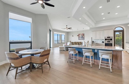 Iona Shores House | Stunning S. Fort Myers Riverfront Home With Unforgettable Sunsets! 2 Primary Suites! Heated Pool!