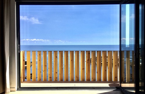 Lagoa House | Stunning sea front private villa steps away from the sea & natural pools