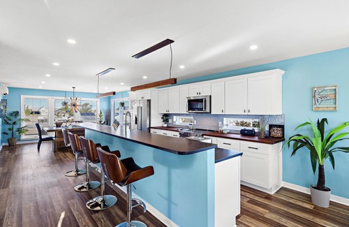 Mystic Island House | Stunning 2600 ft² waterfront home, pet friendly, 8 person hot tub, rooftop deck