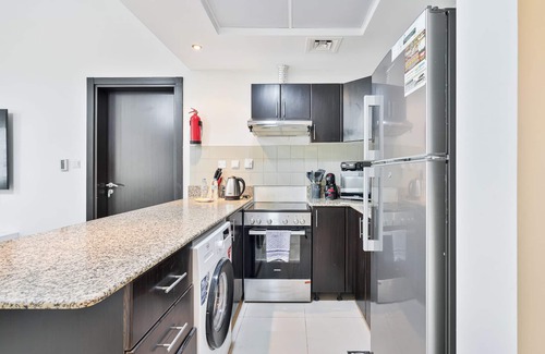 Dubai Apartment | Stylish 1BR w/Balcony, Pool, Gym & Free Parking