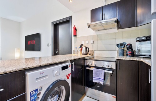Dubai Apartment | Stylish 1BR w/Balcony, Pool, Gym & Free Parking