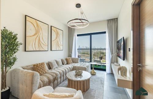 Nad Al Sheba Apartment | Stylish 1BR with City and Partial Burj View by BMS