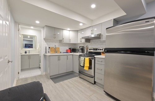 Pickering Apartment | Stylish 2BR: w/free parking & streaming!