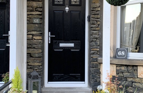 Bowness-on-Windermere House | Stylish 4 bedroomed cottage with games room, 2 minute walk to Bowness high st