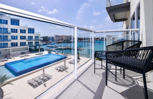 Oranjestad Apartment | Stylish luxury condo, central location, ocean view, pool, gym