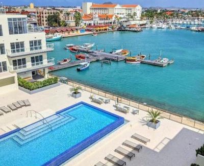 Oranjestad Apartment | Stylish luxury condo, central location, ocean view, pool, gym