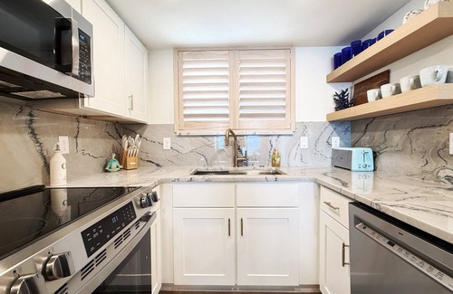 New Smyrna Beach Condo | Stylish Oceanfront Corner Condo Steps to Beach & Flagler Ave Fun