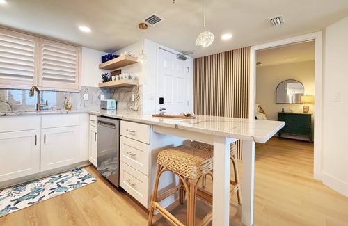 New Smyrna Beach Condo | Stylish Oceanfront Corner Condo Steps to Beach & Flagler Ave Fun