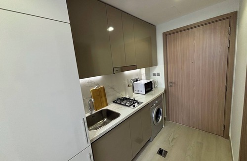 Dubai Apartment | Stylish studio with large balcony & private parking in Azizi Riviera