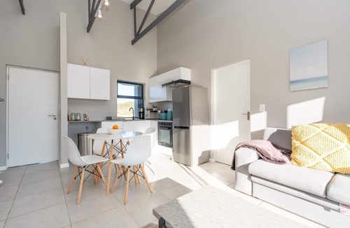 Mykonos Apartment | Stylish Urban Stay | Balcony | Lagoon View