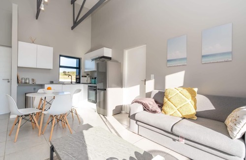Mykonos Apartment | Stylish Urban Stay | Balcony | Lagoon View