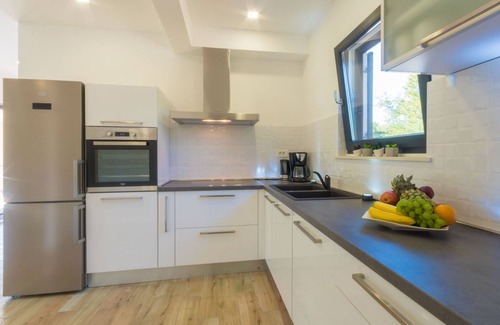 Krsan Villa | Stylish villa with large garden and inviting pool area