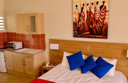 Terre-de-Haut Apartment | Suite 108 - Porcelain Rose