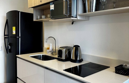 Santa Marta Apartment | Suite deluxe with private Jacuzzi and ocean view.