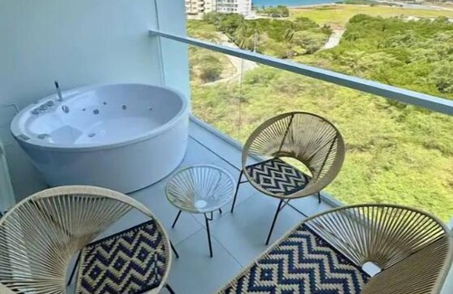 Santa Marta Apartment | Suite deluxe with private Jacuzzi and ocean view.